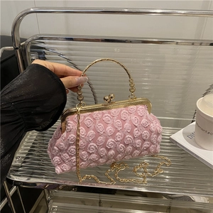 Pink 3D floral crossbody bag with gold round metal handle and vintage clip closure