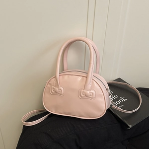 Schicke rosa Bowling-Handtasche mit Schleifen-Relief und abnehmbarem Umhängeriemen für Damen