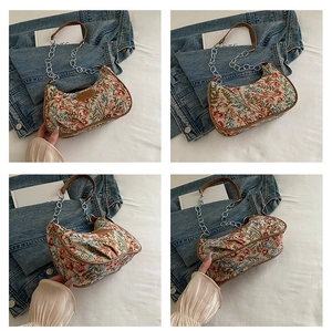 Detail shots of floral tapestry crossbody bag with brown leather trim and silver chain