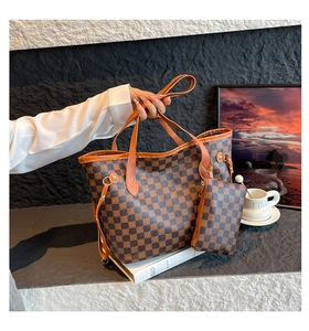 Close-up of stylish brown checkered tote bag set with matching small zipper pouch
