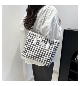 Detail of checkered tote bag with JINGPIN logo showing large capacity and white straps