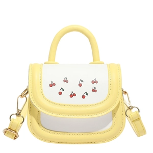 Mini crossbody bag in yellow and white featuring red cherry patterns and top handle