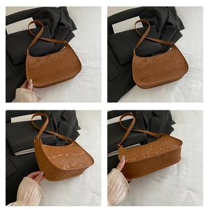 Multi-angle view of brown snakeskin textured crescent shoulder bag with gold hardware
