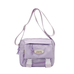 Large lavender nylon crossbody bag with contrast white mesh pocket and buckle closure