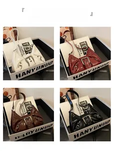 Detail view of four pleated hobo bags in beige, burgundy, brown, and black colors