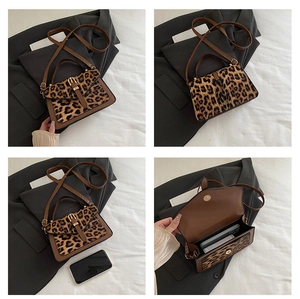 Detail view of leopard print crossbody bag with inner space showing storage capacity