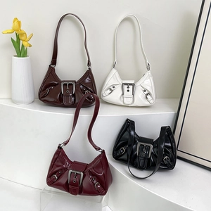 Retro Y2K crescent underarm bags with metallic buckle details in four classic colors