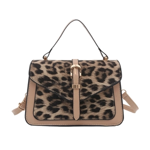 Elegant leopard print pony hair shoulder bag with beige leather trim and gold buckle