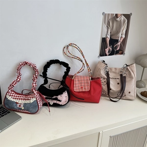 Collection of nylon and canvas tote bags featuring checkered patterns and cute illustrations