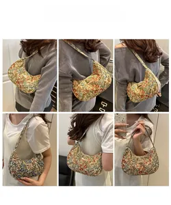 Floral canvas hobo shoulder bag shown on model in various lifestyle settings and angles