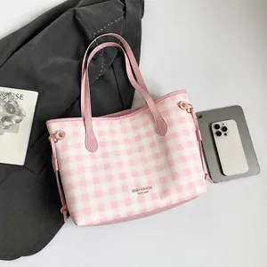 Top view of pink checkered tote bag with SN&FASHION branding and side drawstring details