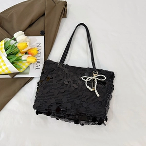Chic black sequin shoulder tote bag for women featuring a delicate pearl bow pendant
