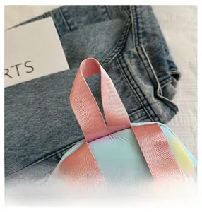 Close-up of durable pink nylon handle and gradient fabric on stylish large backpack