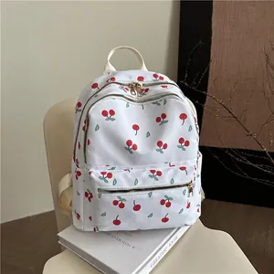 Witte canvas rugzak met kersenprint, hoofdvak met dubbele rits en zijvakken