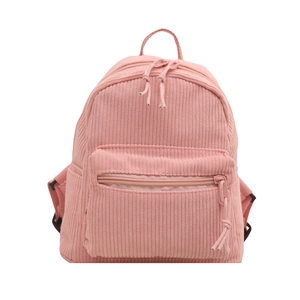 Pink corduroy mini backpack with vertical ribbed texture and multi-pocket design for women