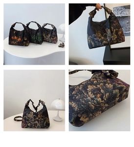 Detailed view of floral crescent bag with knotted handles and textured fabric finish