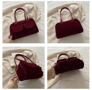 Detail view of burgundy suede tote bag featuring front flap pockets and retro design