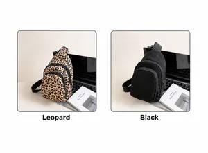 Close-up of leopard print and black crossbody chest bags with dual front zippers