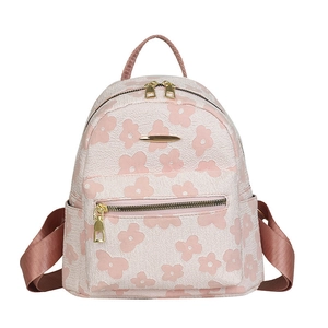 Damen Rucksack aus rosa floralem Jacquard-Canvas mit goldenen Reißverschlüssen und viel Platz