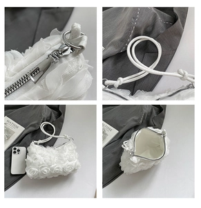 Détails du sac à fleurs 3D en résille blanche avec zip argenté et bandoulière en cuir nouée