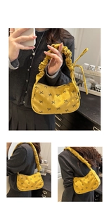 Détail du sac à bandoulière en velours côtelé jaune avec broderie nœud et anse froncée