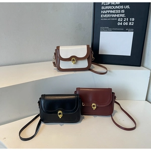 Retro flap crossbody square bag in brown, black, and red with gold ring buckle