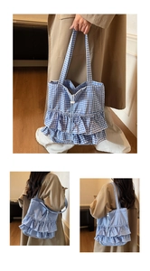 Detail of blue and white checkered tote bag with tiered ruffle layers and drawstring closure