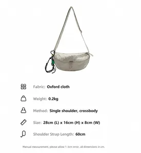 Detail specifications of beige oxford fabric crescent crossbody bag showing size and weight