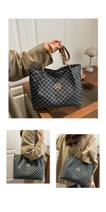 Detailed view of fashionable large capacity tote bag with letter print and chain strap