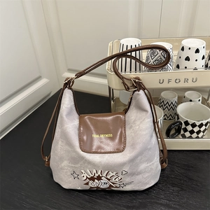 Borsa a tracolla retrò in tela con patta in pelle marrone e stampa cartoon vintage