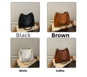 Detail view of large tote bag knots in black, brown, white and coffee colors