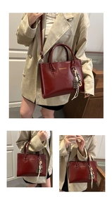 Détails du sac cabas en cuir verni bordeaux avec chaîne dorée et ruban élégant