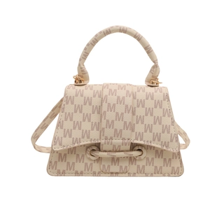 Minimalist beige crossbody bag with M-letter monogram and elegant gold hardware