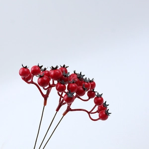 Artificial red Christmas berry branches with glossy finish for festive DIY home decor