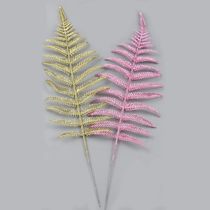 Glitter hollow Christmas leaves in gold and pink for festive tree decor and scenery