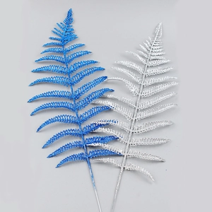 Glittery blue and silver fern leaf ornaments for Christmas tree decoration scenery