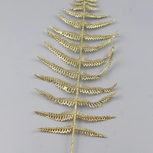 Glittery gold artificial fern leaf branch for Christmas tree and festive home decoration