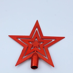 Close-up of a three-tier red star tree topper with hollow design and textured finish