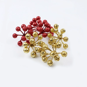 Detail of red and gold glittered foam berries for festive Christmas wreath decoration