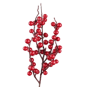 Vibrant red Christmas berry branches with glossy finish for festive tree decoration