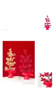 Close-up of artificial red holly berry tree with festive gold bag base for New Year decor