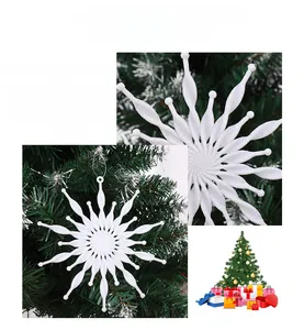 Detail view of 3D white glitter snowflake ornaments for outdoor Christmas tree decoration