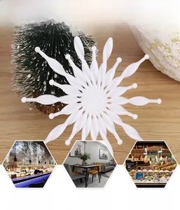 Detailed view of 3D white snowflake ornaments with glitter finish for Christmas tree decor