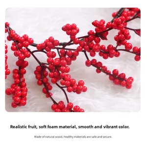 Close-up of artificial red berries with realistic texture for festive home decoration