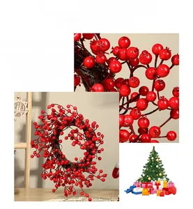 Close-up of vibrant red artificial berries with glossy finish on a rustic Christmas wreath