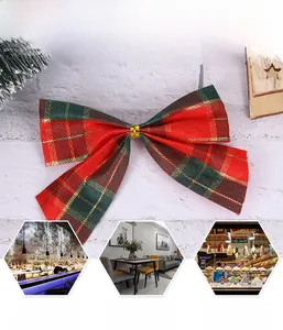 Macro shot of Scottish red and green plaid Christmas bows with golden metallic threads