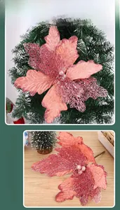 Close-up of glittered Christmas flower decorations with mesh petals for holiday trees