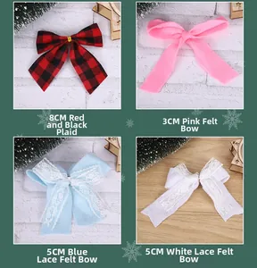 Detailed view of assorted Christmas fabric bows in red plaid, pink felt, and lace styles
