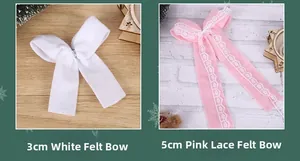 Detail view of handmade felt Christmas bows with lace trim in white and pink colors
