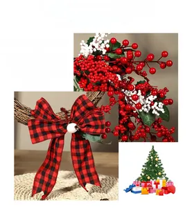 Detail of festive Christmas wreath with red berries, green leaves, and plaid bow